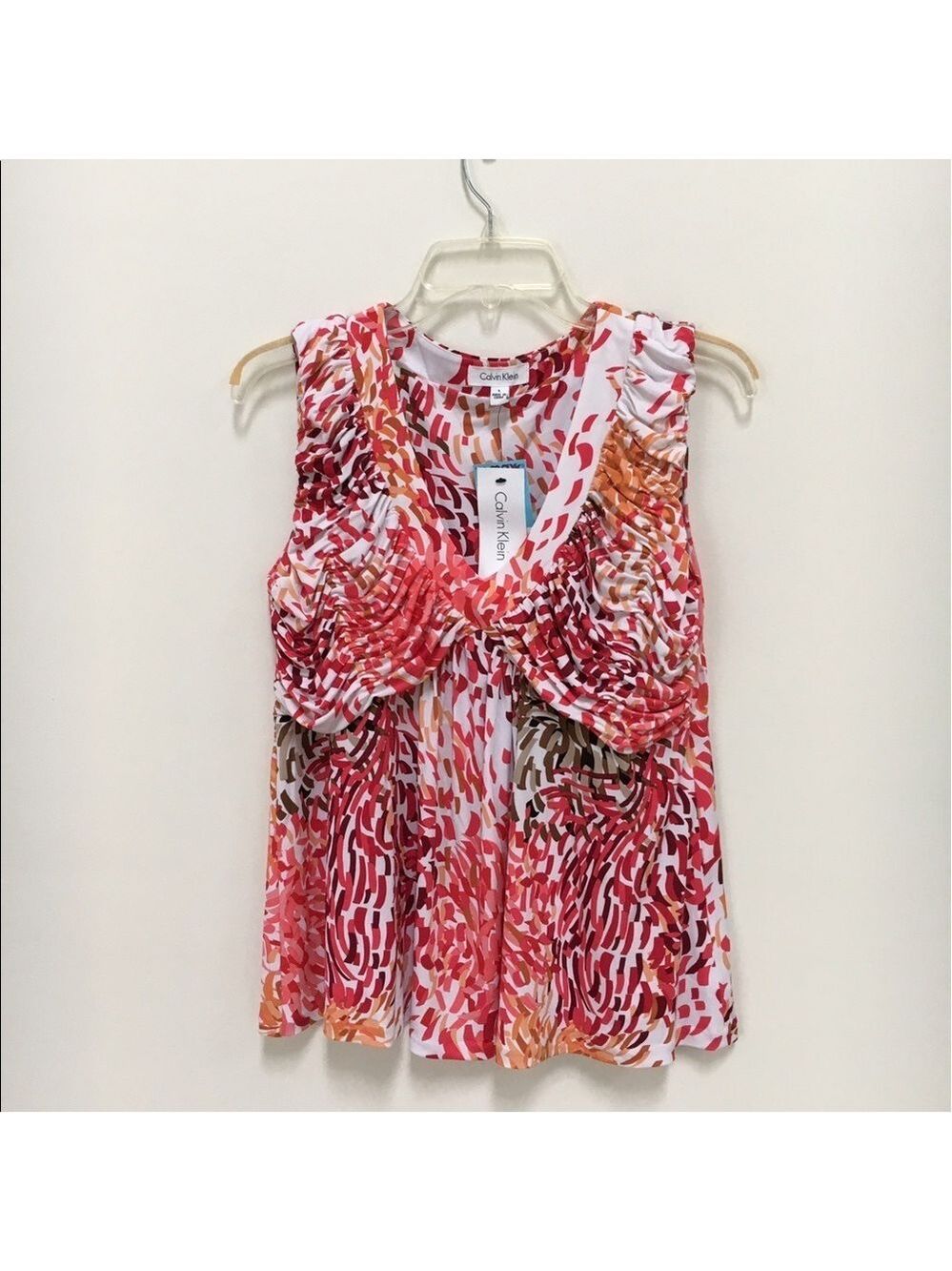𝅺CALVIN Klein sleeveless shirred blouse.
